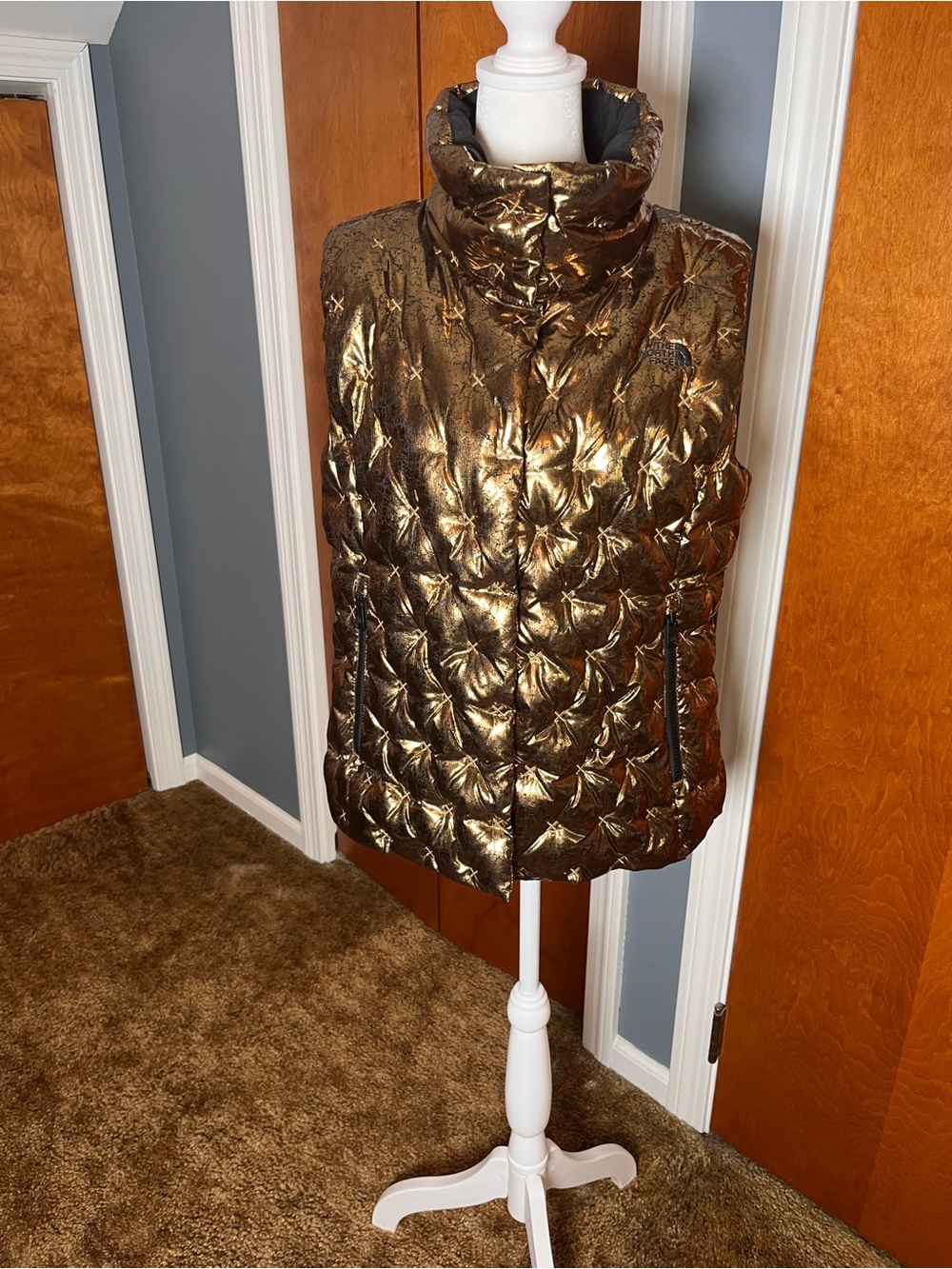 The North Face Metallic Gold Quilted Puffer Vest, button closure, women’s large.